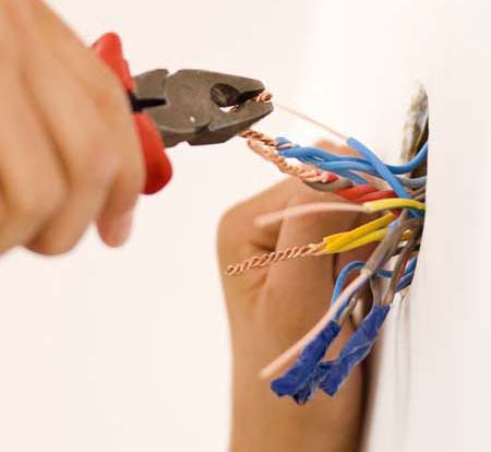 Man working on electrical wires